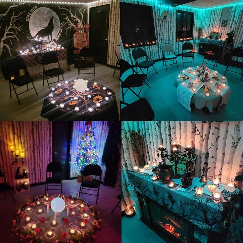 A warmly lit event space at The Zen Shop’s Zen Den with candles, seasonal decor, and chairs arranged for workshops or rituals
