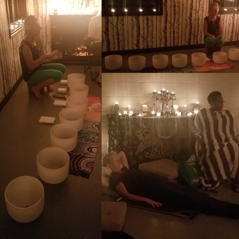 Crystal singing bowls arranged with soft lighting and cushions for a group sound bath or guided hypnosis session at The Zen Shop’s Zen Den