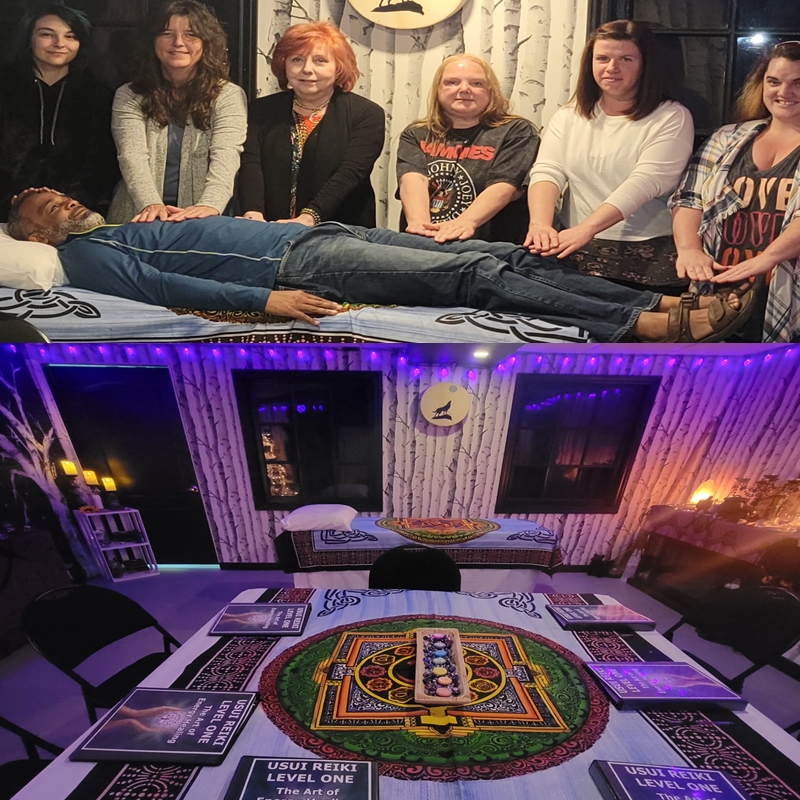 Group of Reiki students with certificates gathered after completing a course at The Zen Shop