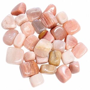 Pile of tumbled pink aventurine stones