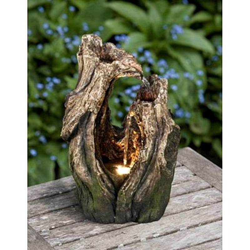 water-fountain-hollowed-tree-trunk